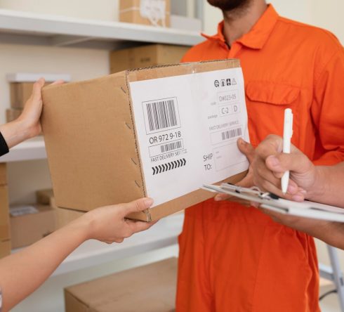 close-up-hands-handing-delivery-boxes-courier_23-2148944565 close-up-hands-handing-delivery-boxes-courier_23-2148944565